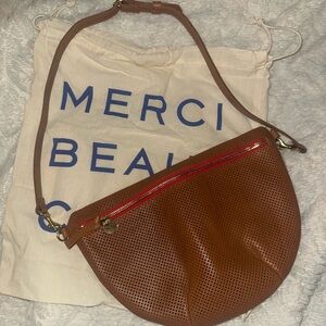 Chic Brown Leather Crossbody Bag with Red Accents